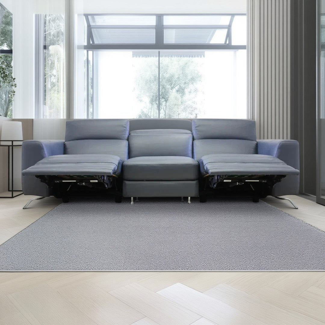 Sofá reclinable Pensiero Natuzzi azul en piel