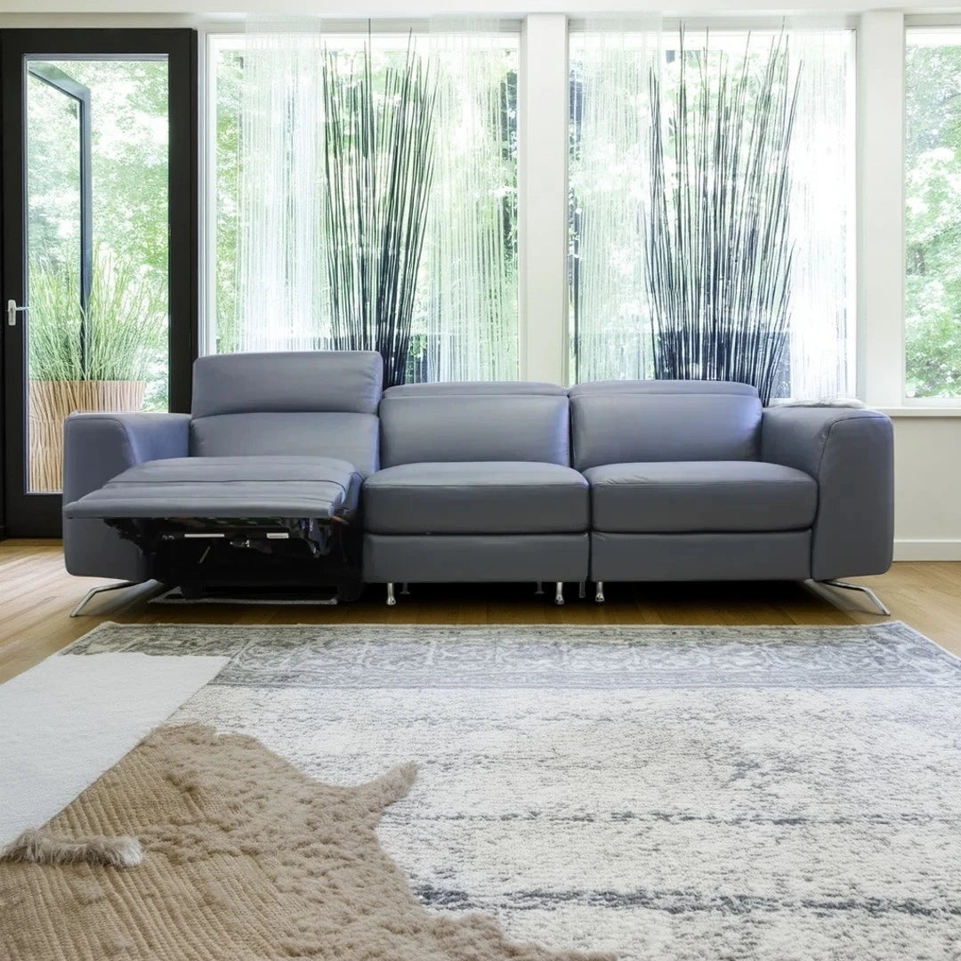 Sofá reclinable Pensiero Natuzzi azul en piel
